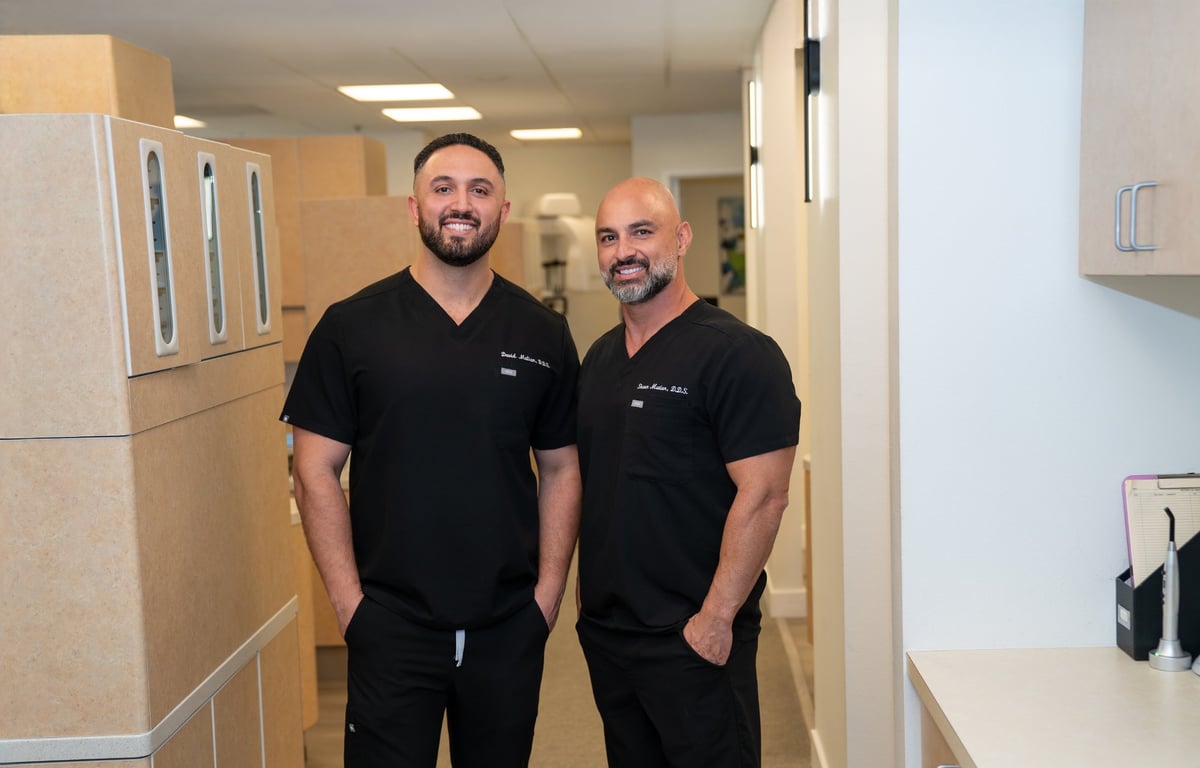Drs. Shawn and David Matian reviewing a patient case